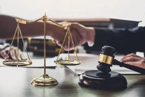 lawyer and client shaking hands